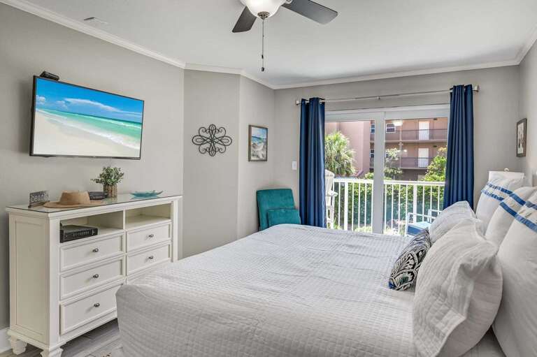 Peaceful and Private - Light-blocking curtains, a
cozy reading chair, and access to the balcony make
this your own personal retreat