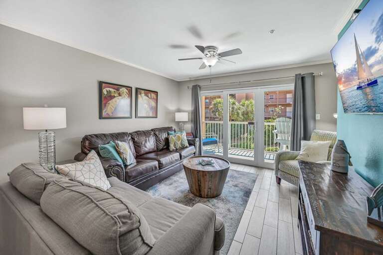 Spacious Living Room for the Whole Crew - Stretch
out on the oversized sectional with room for
everyone to relax after a beach day.