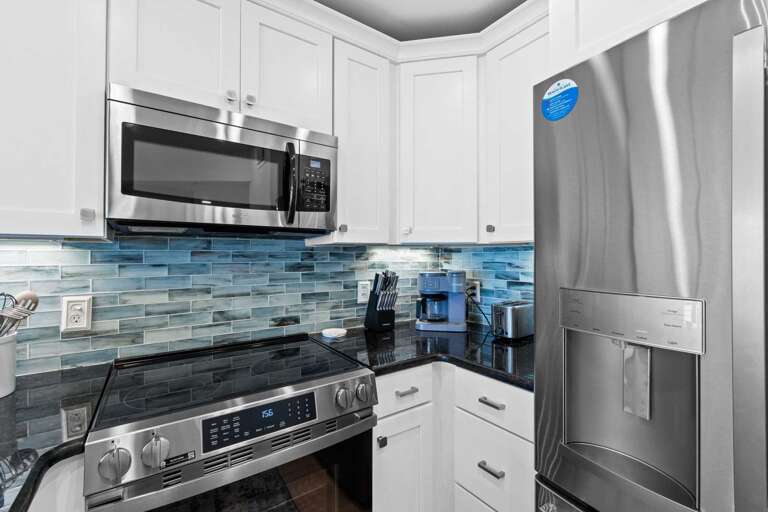 	"Drift off to wave lullabies-the primary bedroom serves direct balcony access and a dreamy king bed."	"Drift off to wave lullabies-the primary bedroom serves direct balcony access and a dreamy king bed."