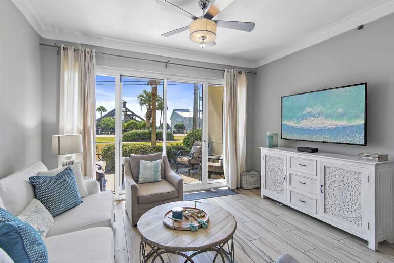 Bright Living Room - Relax in comfort just steps from the Gulf at this Leeward Key condo in Destin, Florida.