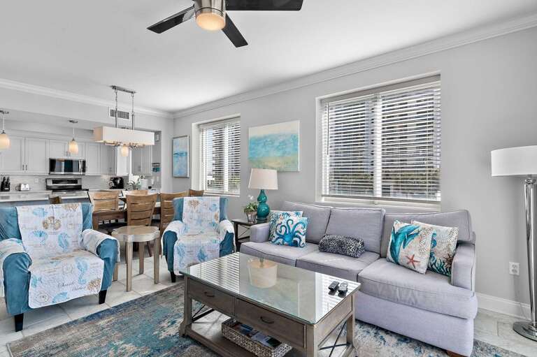 Coastal-inspired living room with beach views and comfy seating