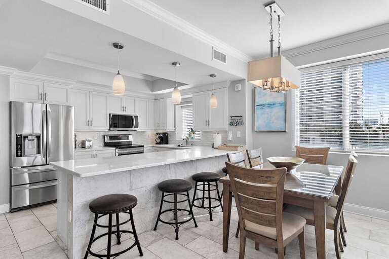 Living room opens directly to the private balcony with ocean breeze