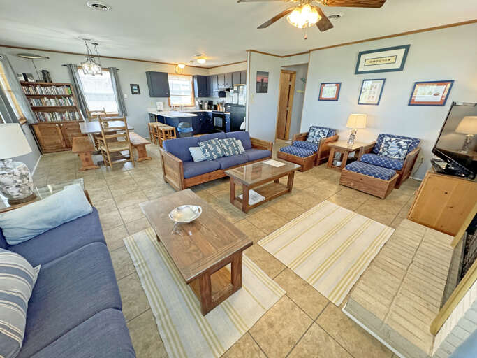 Living Room Interior With Furniture And Kitchen In Background
