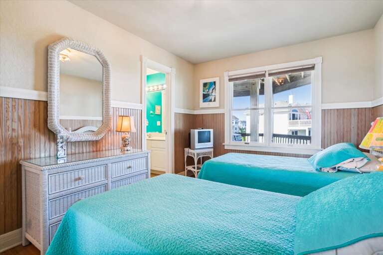 Twin Beds In A Bright Room With A Mirror And Window Twin Beds In A Bright Room With A Mirror And Window