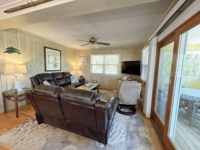 Interior Living Space With Leather Sofa And Television