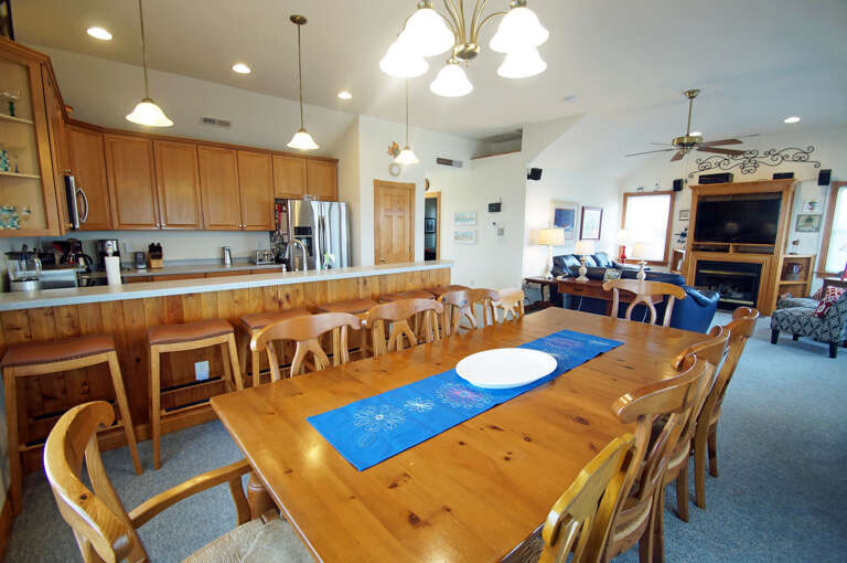 Residential Interior With Dining Table And Kitchen
