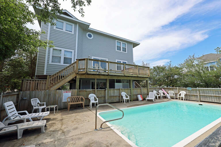House With Pool And Wooden Deck
