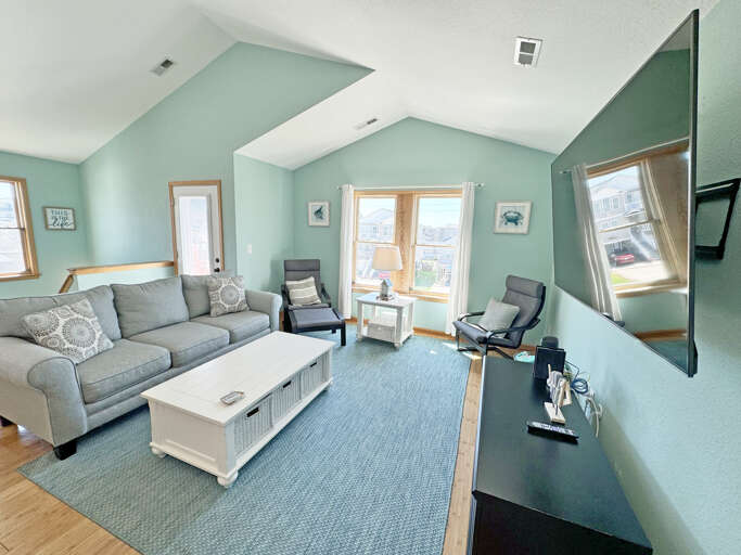 Interior Living Space With Furniture And Television