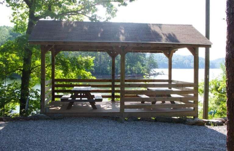 Enjoy a family picnic by the lake underneath the covered area. 