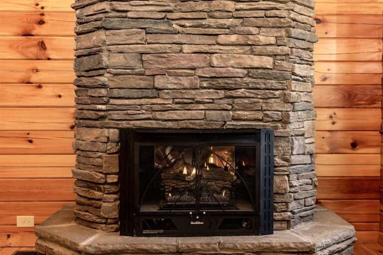 The gas fireplace is on with just the flip of a switch.