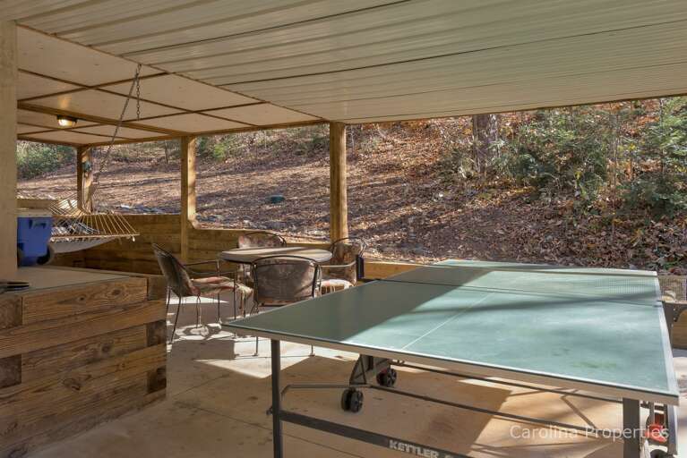 Ping-pong table under the covered lakeside deck