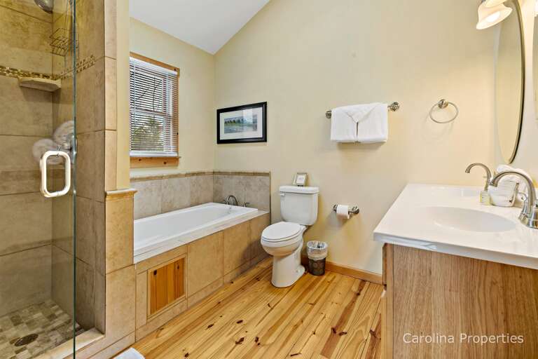 Upper level bath with jetted tub and shower