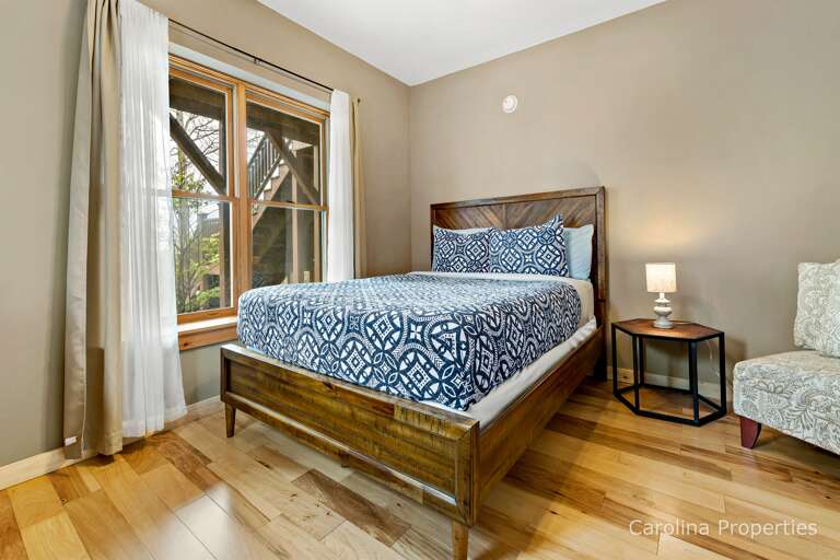 Bedroom lower level with a queen bed