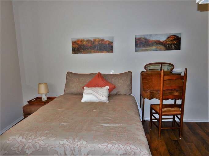 Additional view of upper level bedroom with full bed