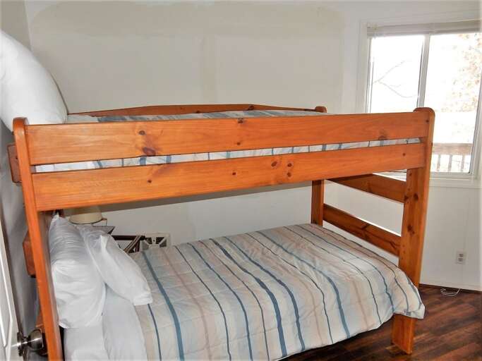 Lower level bedroom with twin size bunk bed