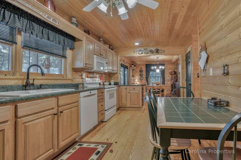 View of kitchen and dining tables