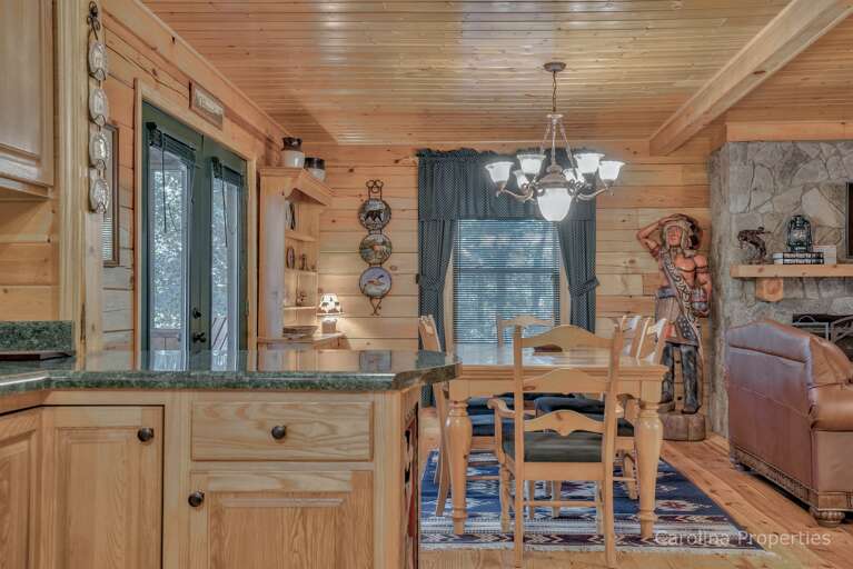 Additional view of dining table from kitchen Additional view of dining table from kitchen