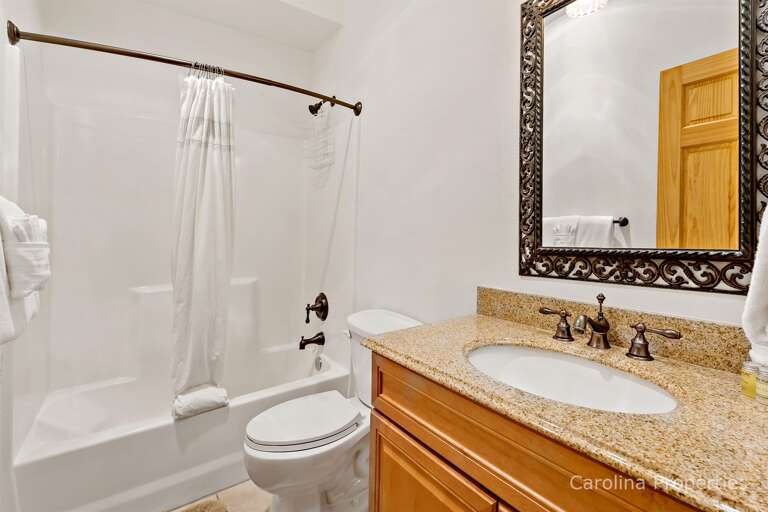 A full bath, complete with tub/shower combination, is nearby
