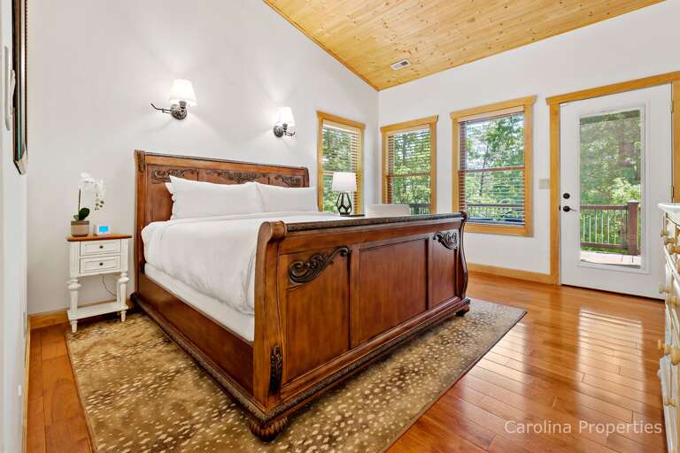 On the main level are two suites, each with adjoining full baths, and deck access