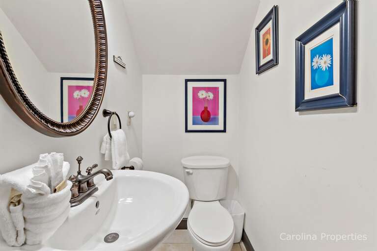 There is a half bath near the bedroom