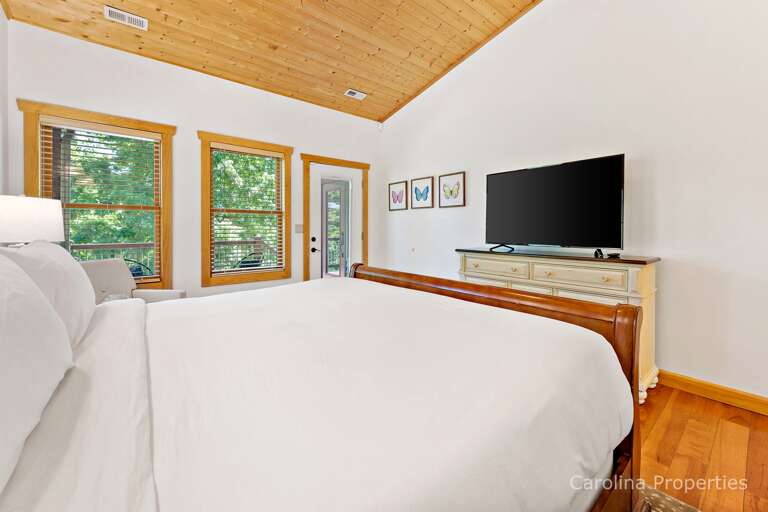 The windows and door let in natural lighting