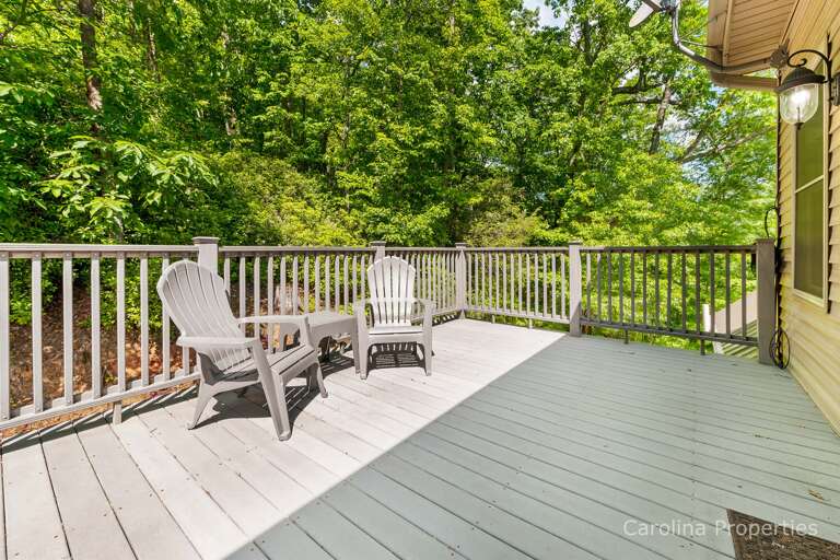 On the deck you will find plenty of seating.