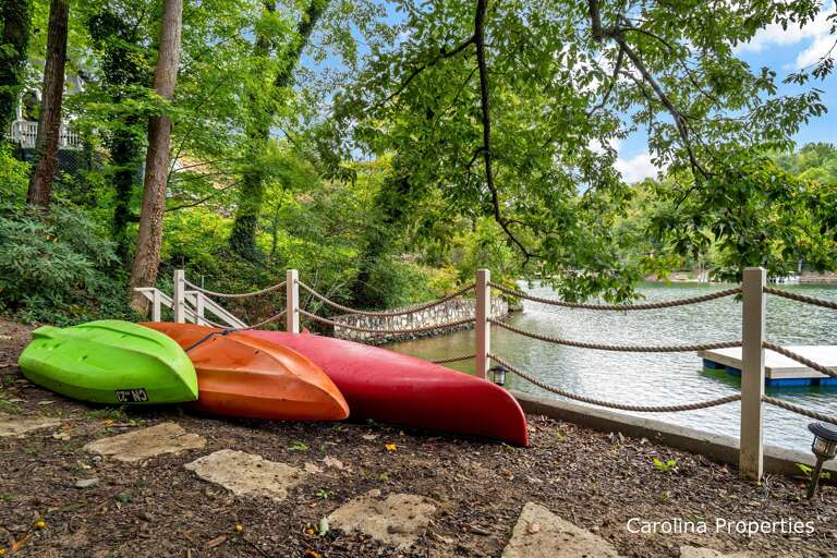 2 kayaks and a canoe