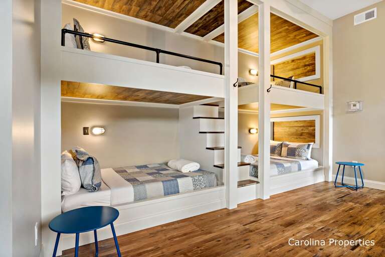 Lower-level bedroom with 2 full and 2 twin beds