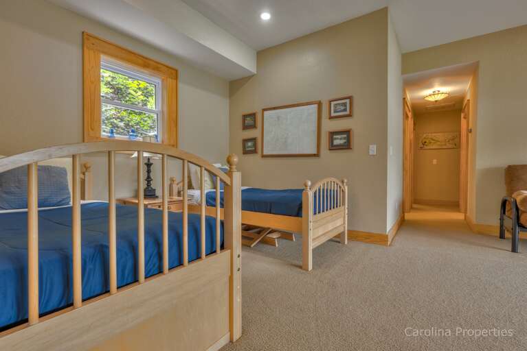 Lower level family room with two twins