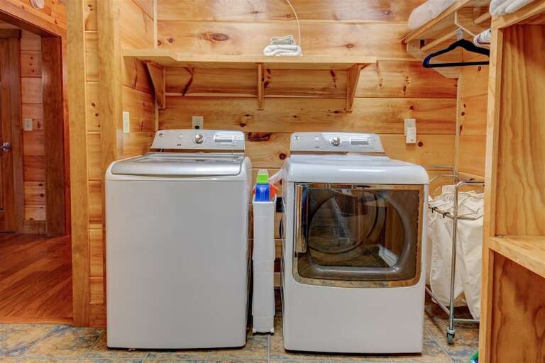 Large laundry room on lower level with super size washer and dryer