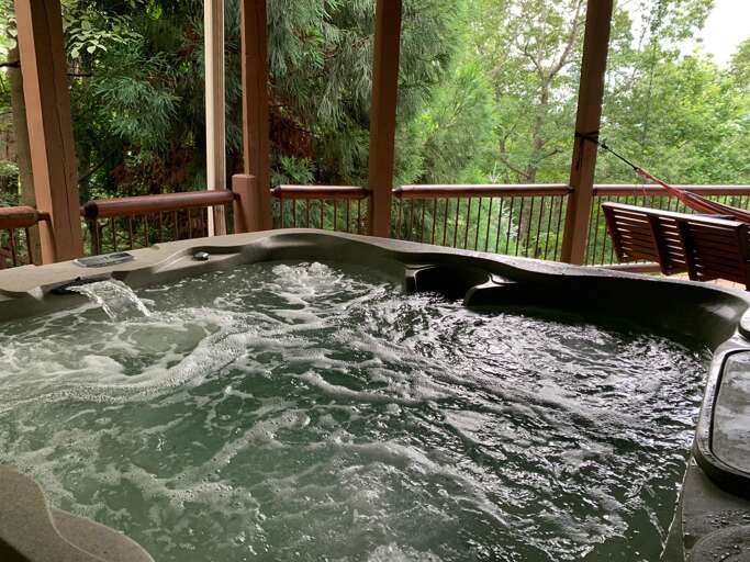 Hot Tub on the covered porch Hot Tub on the covered porch