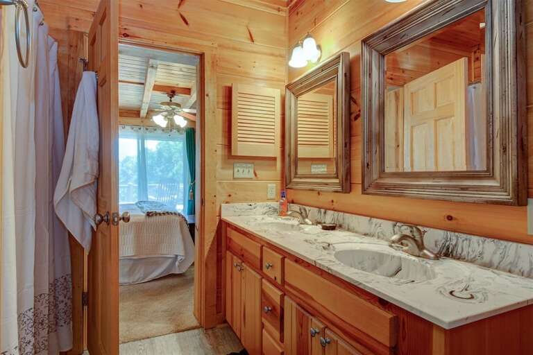 Main level master bath with double vanity