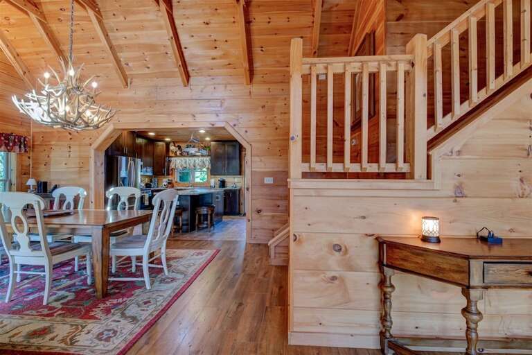 Staircase leading to loft bedroom and half bath