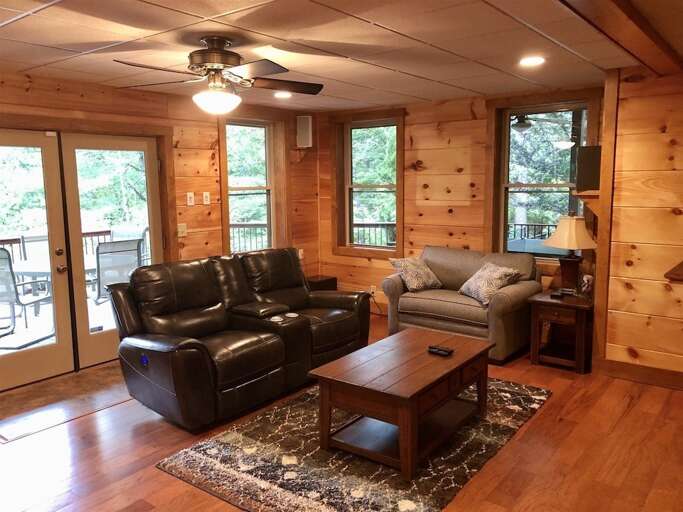 Lower level family room has plenty of cozy seating