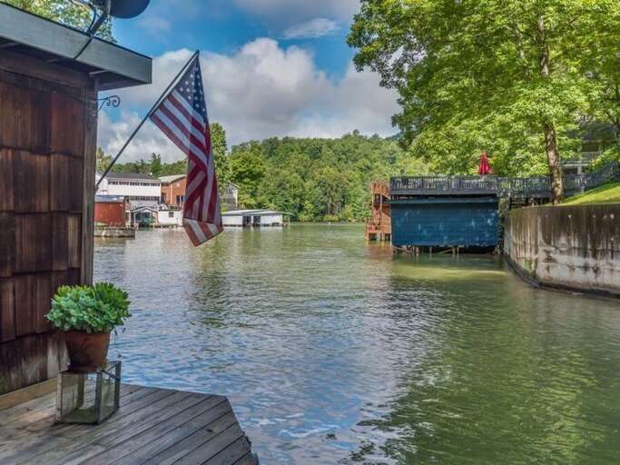 Welcome to Cottage In The Cove, where you can Enjoy views of Lake Lure on the expansive deck!