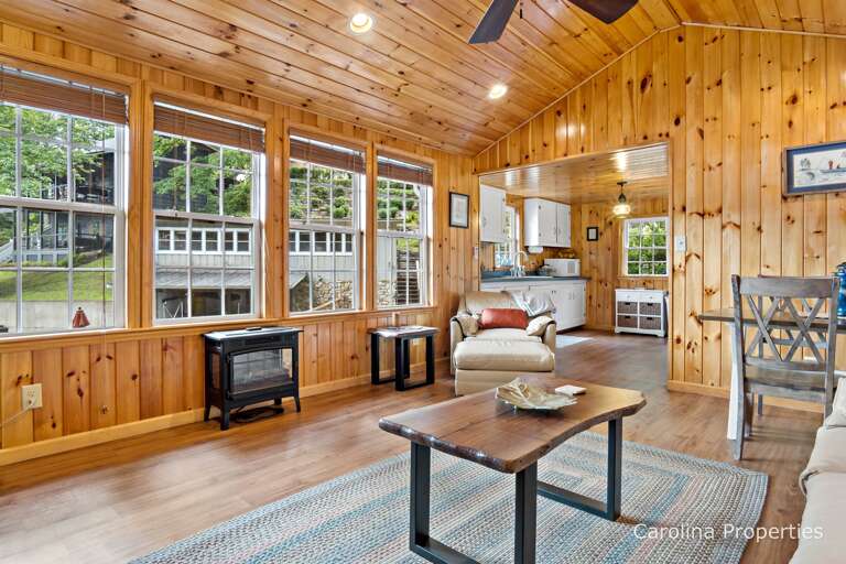 Windows line the wall offering views of Lake Lure