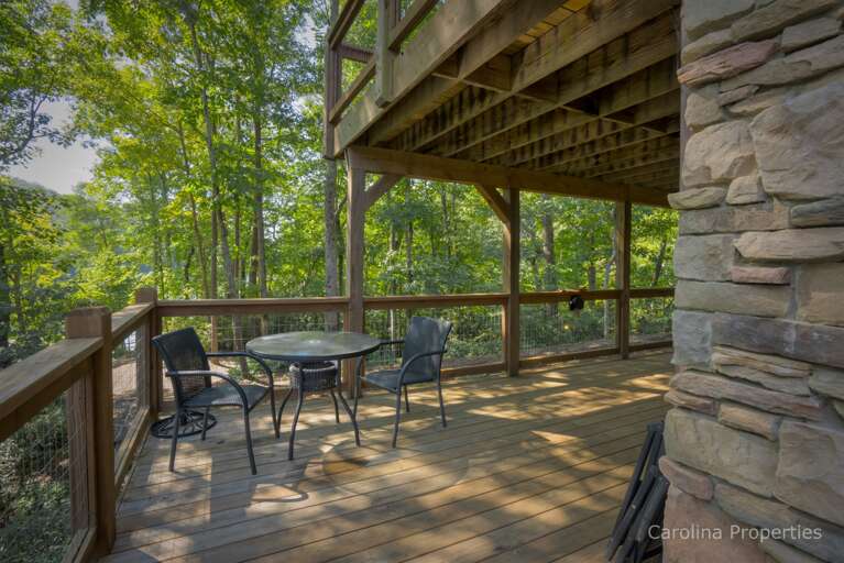 Wraparound patio is detailed with bistro tables