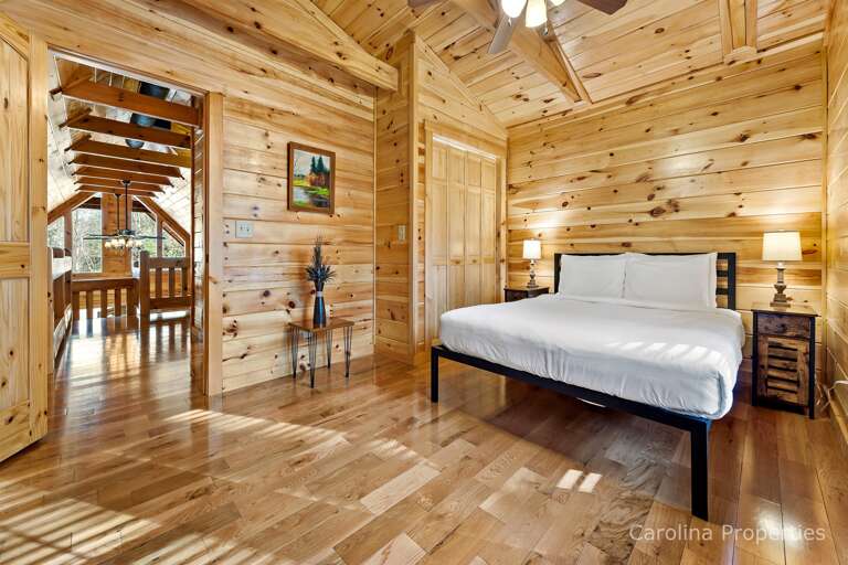 Queen sized bed in upper level