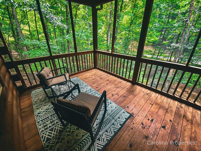 Enjoy a cup of coffee on the screened in porch