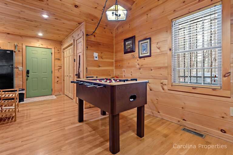 Foosball table in the living area Foosball table in the living area