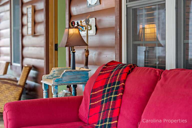 Cozy couch on the screened porch Cozy couch on the screened porch