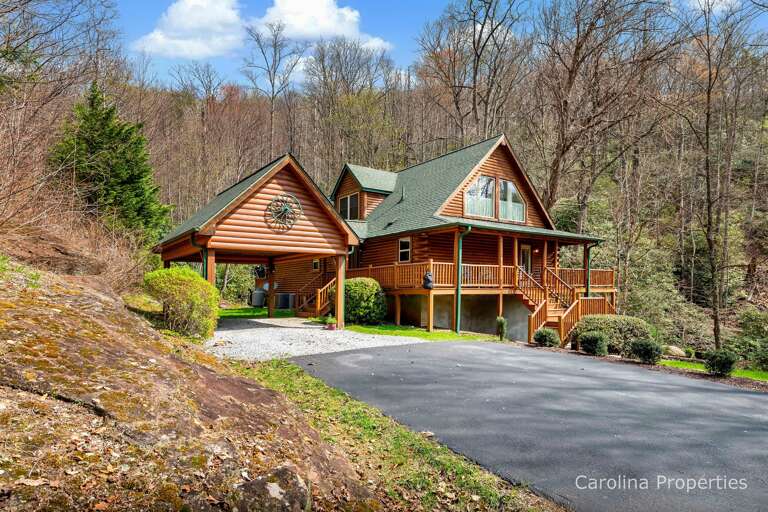 Ample space in the driveway and a car port Ample space in the driveway and a car port