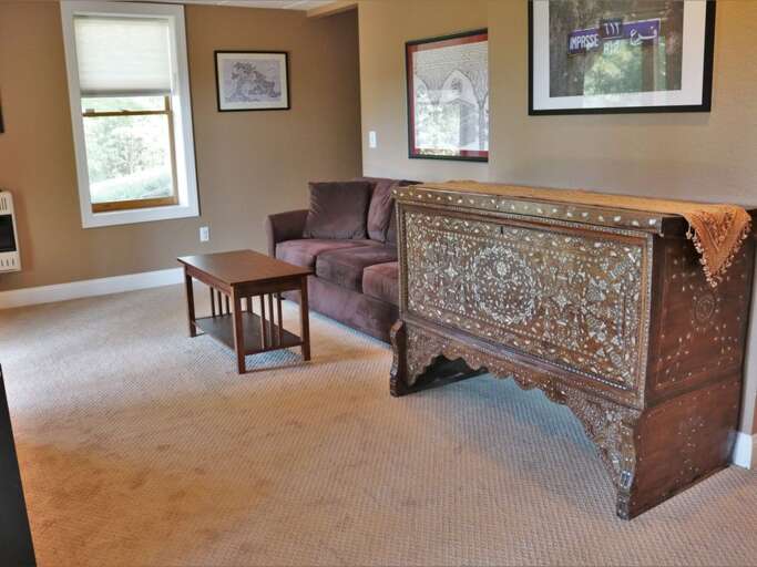 Spacious area in the lower level is perfect for your morning calisthenics or a place for the kiddos to do some somersaults. 