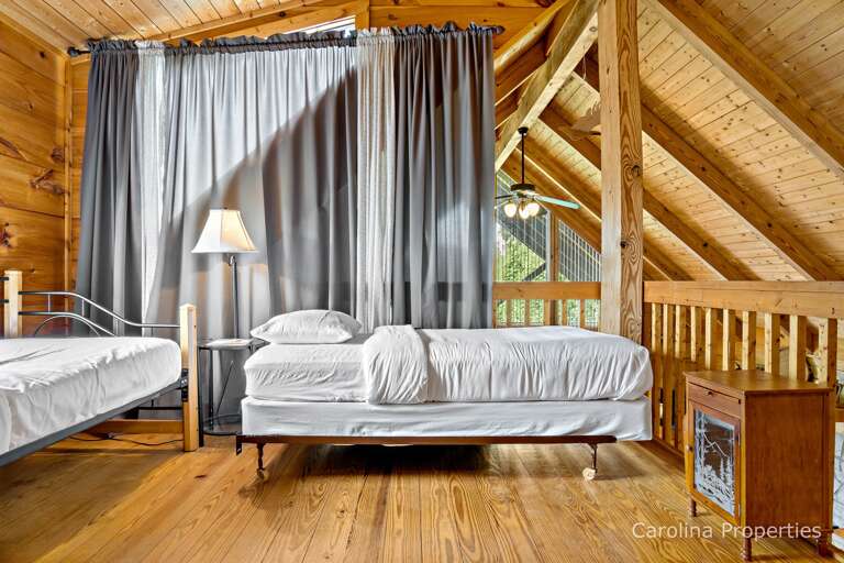In the loft area there is a day bed and a twin bed. You can close the curtain for privacy.