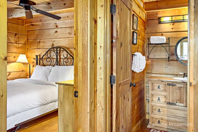 The main level bathroom is between the bedroom and the kitchen