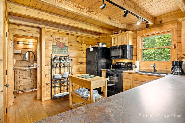 Just off the kitchen is a full bathroom