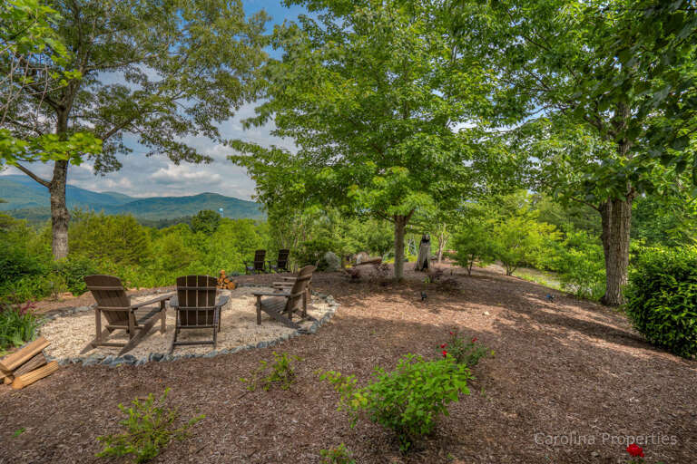 Sit by the fire overlooking the mountains