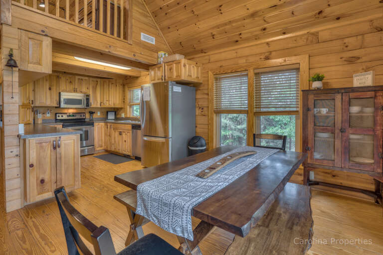 Dining area and kitchen Dining area and kitchen
