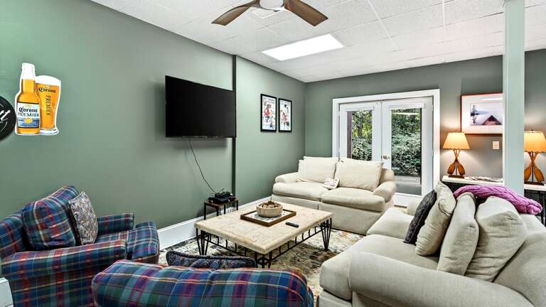 Watch a movie in the lower level game room.