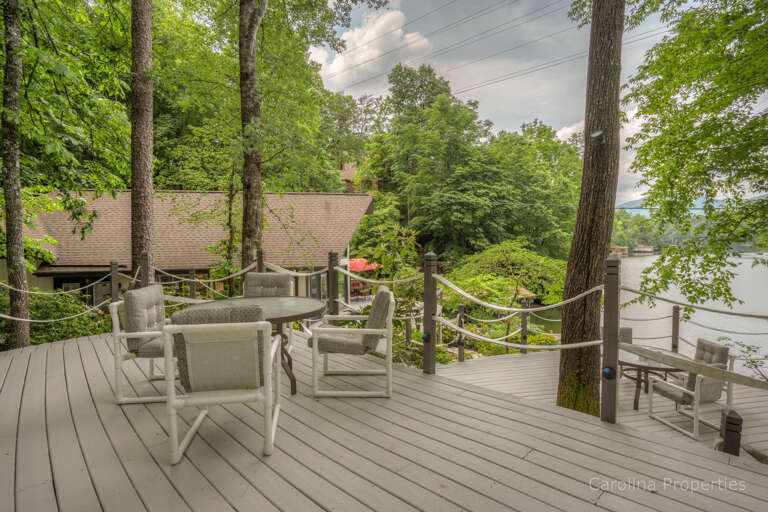 View of Lure Me and outside table with seating